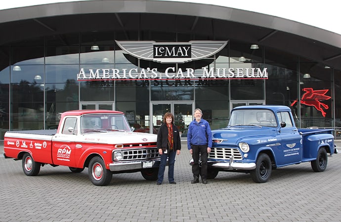 Renee Crist and Dale Wickell of America's Car Museum with two trucks from the Drive Home IV. | America's Automotive Trust photos