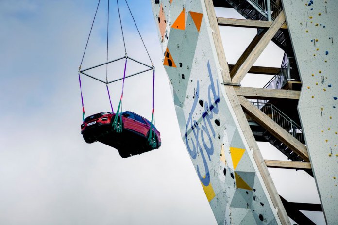 Ford Explorer making its way to the top of the world's tallest free-standing climbing tower | Ford photos